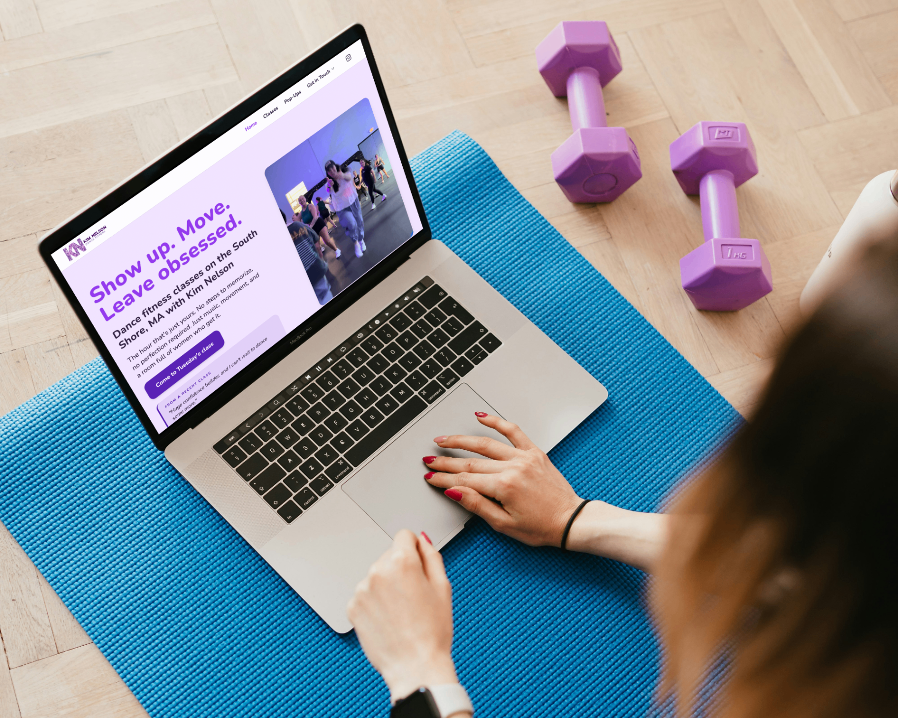 Kim Nelson Dance Fitness website mockup on a laptop